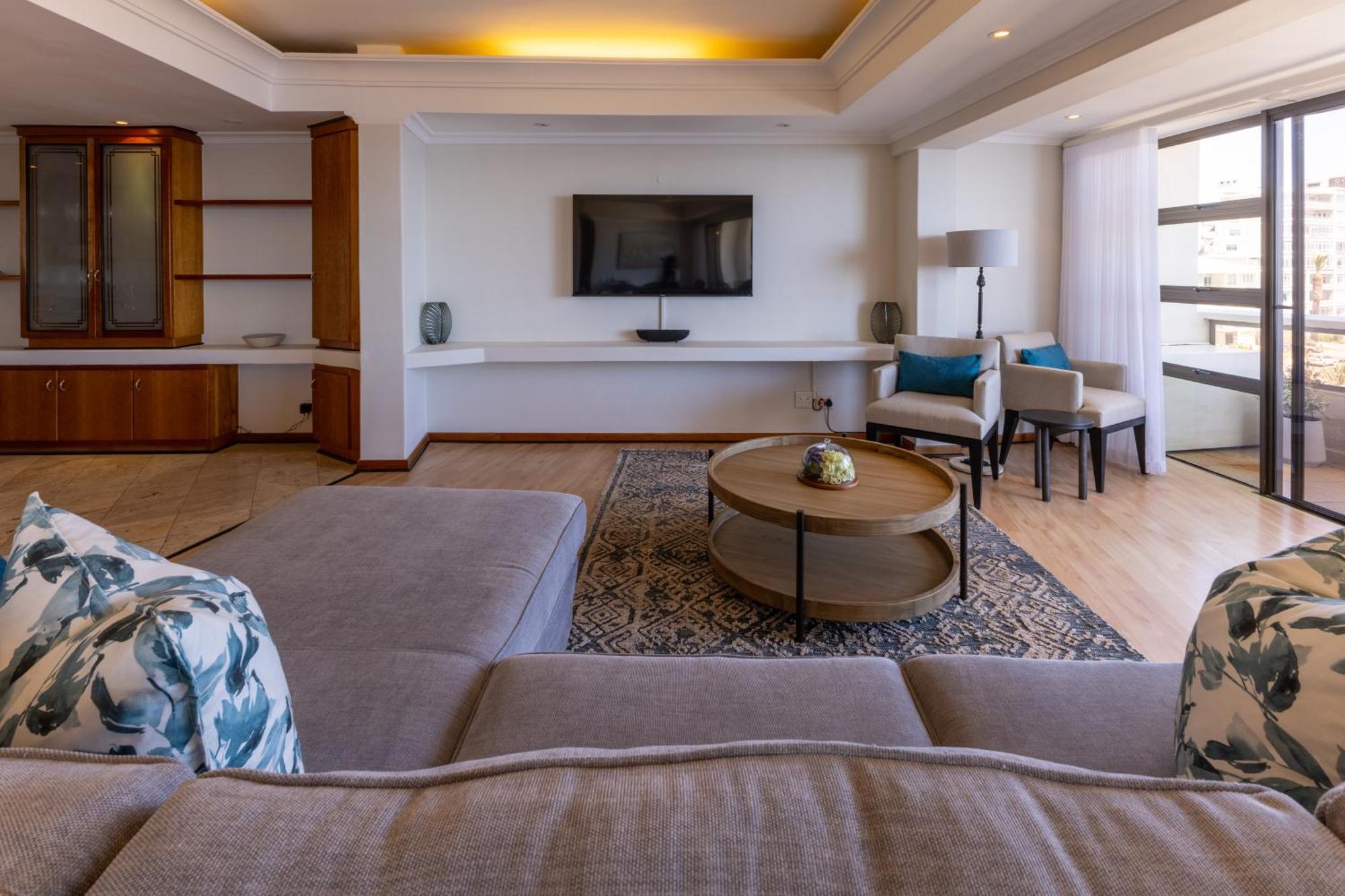Ocean Sunset Bliss - On Beachfront Apartment Cape Town